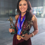Team SIG member Lena Miculek poses with award