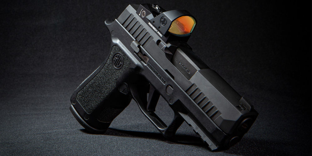 SIG SAUER P-Series pistol with mounted ROMEO1PRO Open Reflex Red Dot Sight