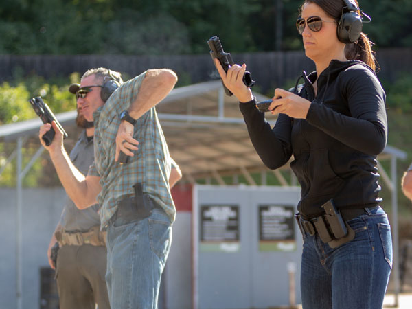 Students at SIG SAUER Academy practicing magazine reloads.