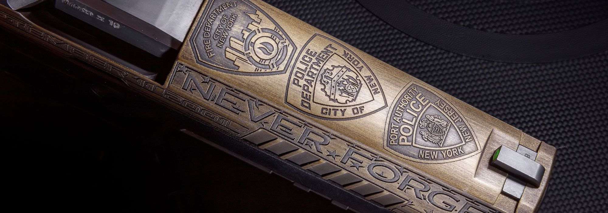 Guns & Ammo/SIG SAUER P320 FCU “Never Forget 9/11 Tribute” Pistol slide top view close up